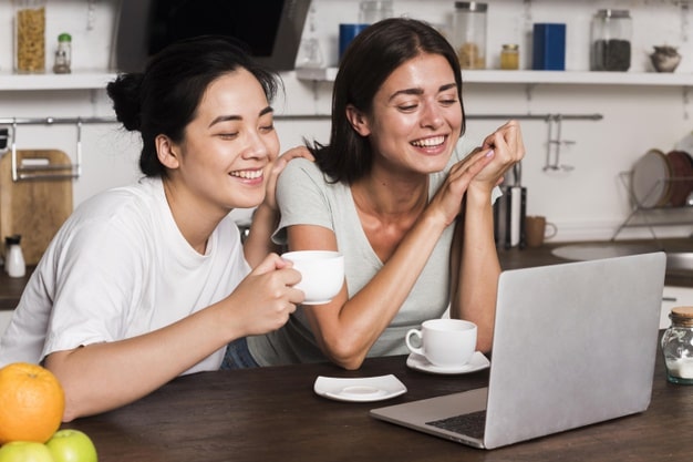 two women chatting online